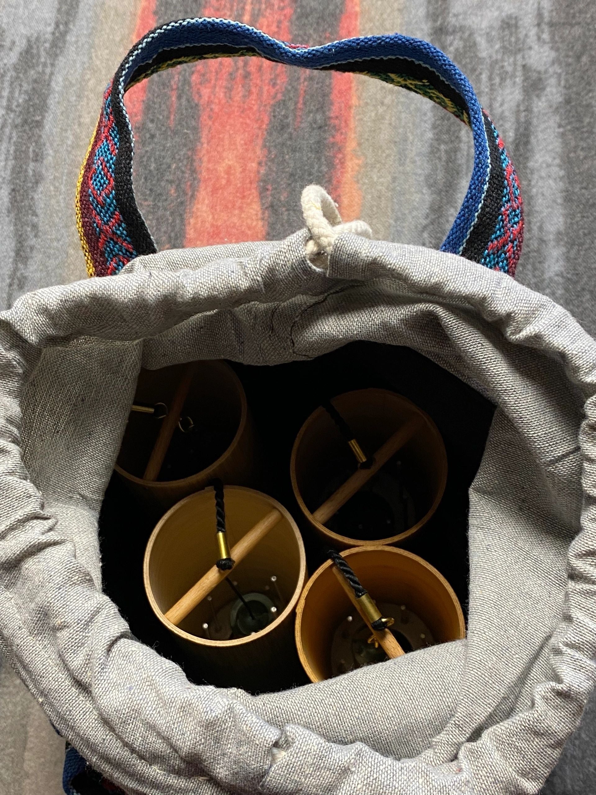 Koshi%20Chimes%20Nestled%20in%20Gheri%20Bag.png